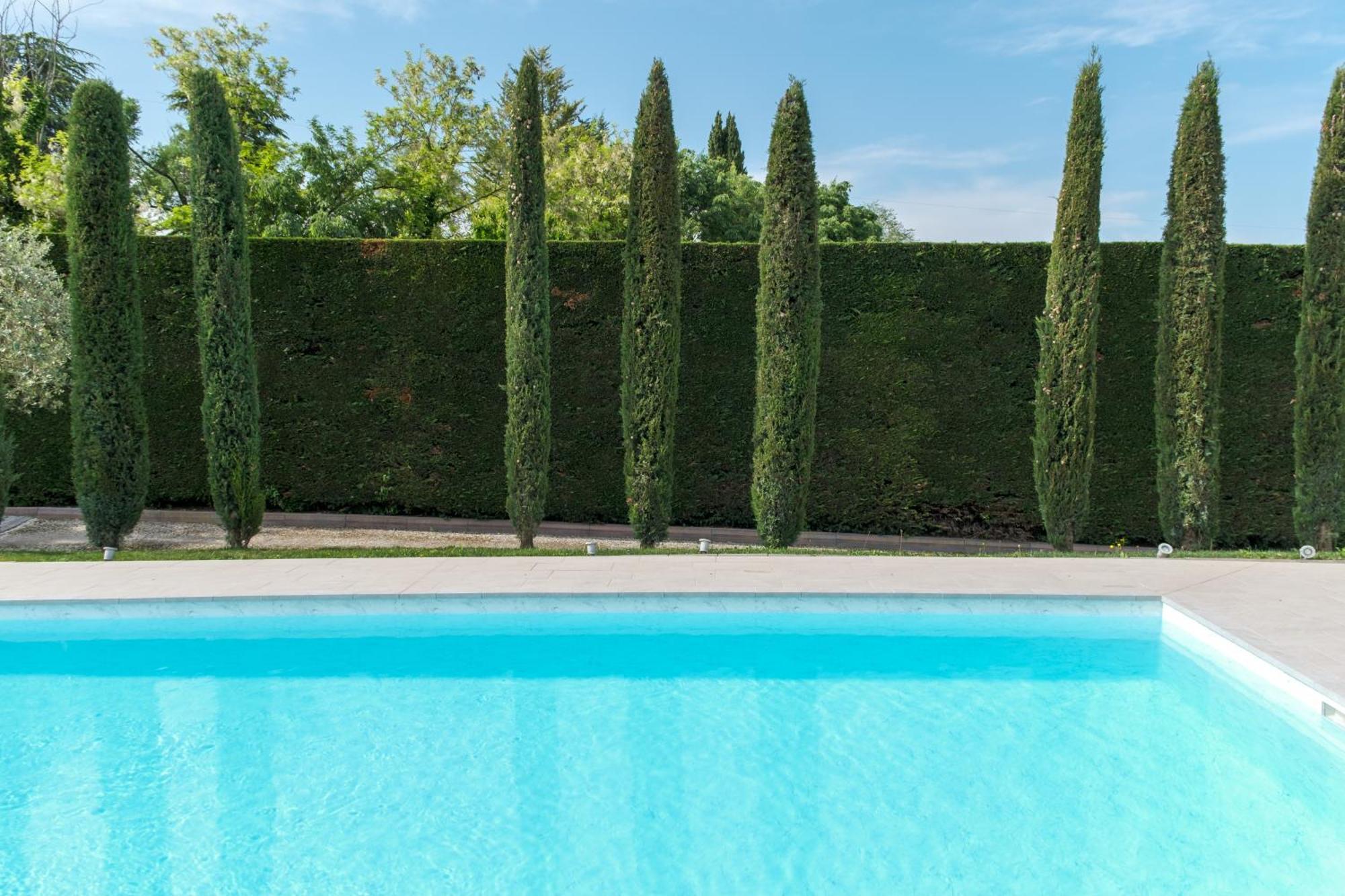 Villa Carini With 3000 Mq Garden & Heated Pool Кастельнуово-дель-Гарда Екстер'єр фото